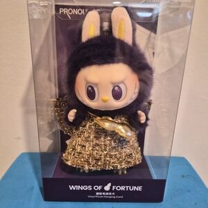 Wings of Fortune Vinyl Plush Hanging Card - Black and Gold